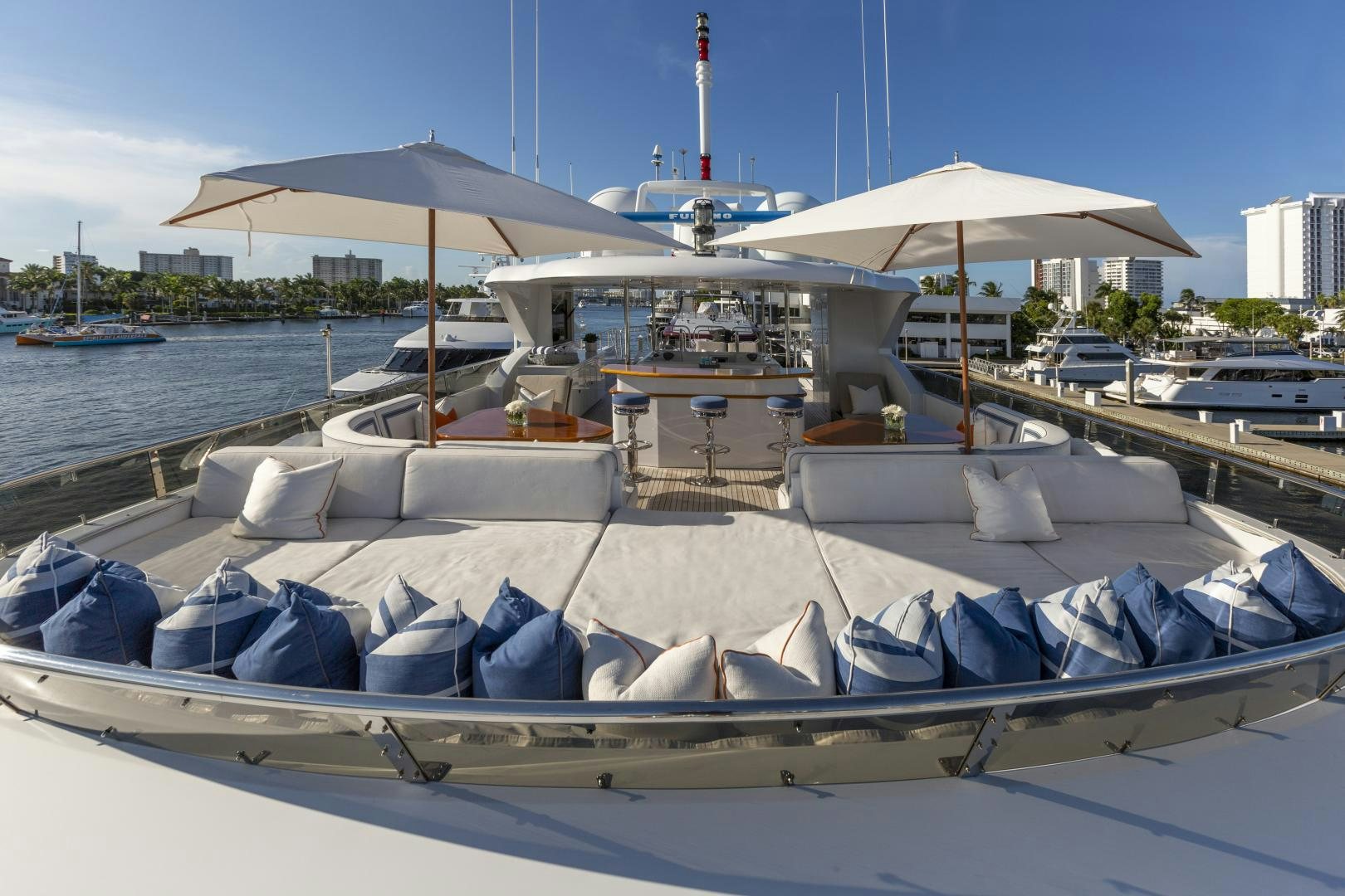 a boat with umbrellas on it aboard FAR FROM IT Yacht for Sale