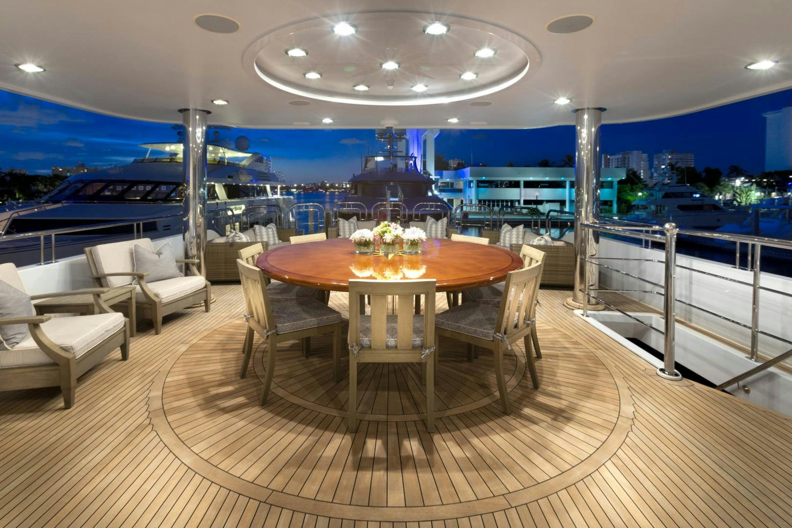a table and chairs in a room aboard FAR FROM IT Yacht for Sale