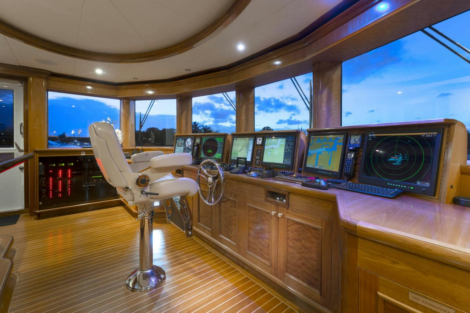 a room with a desk and computer aboard FAR FROM IT Yacht for Sale