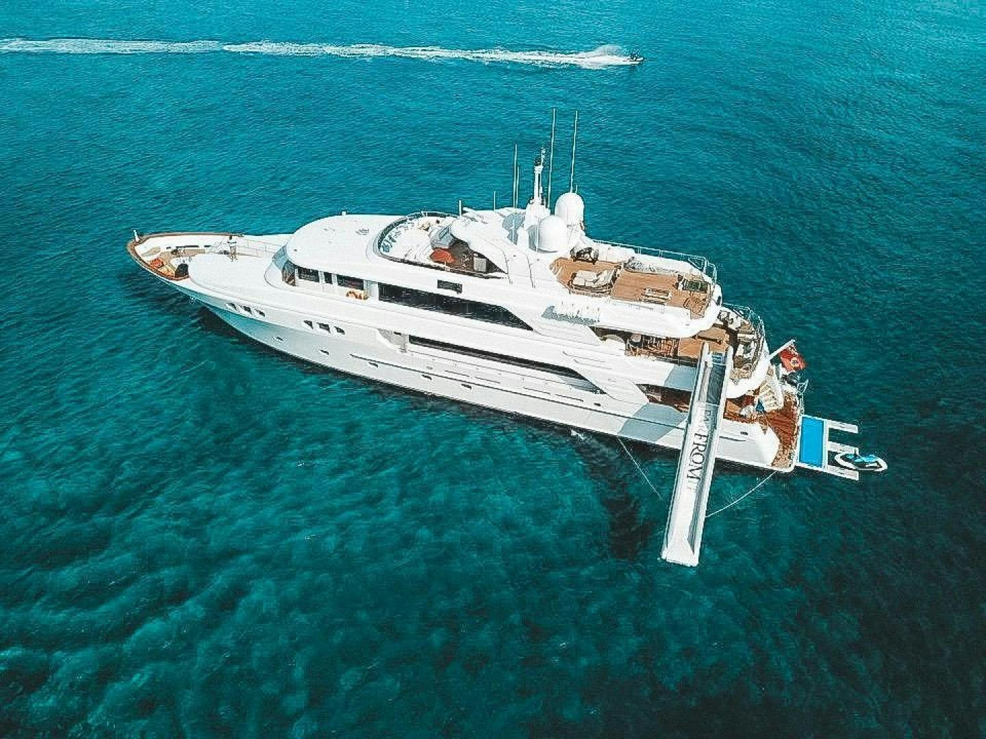 a white boat in the water aboard FAR FROM IT Yacht for Sale