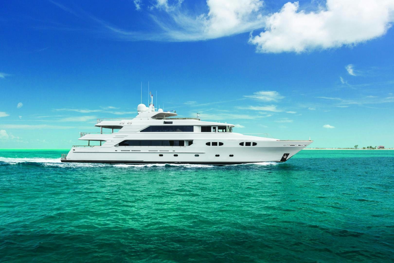 a white boat in the water aboard FAR FROM IT Yacht for Sale