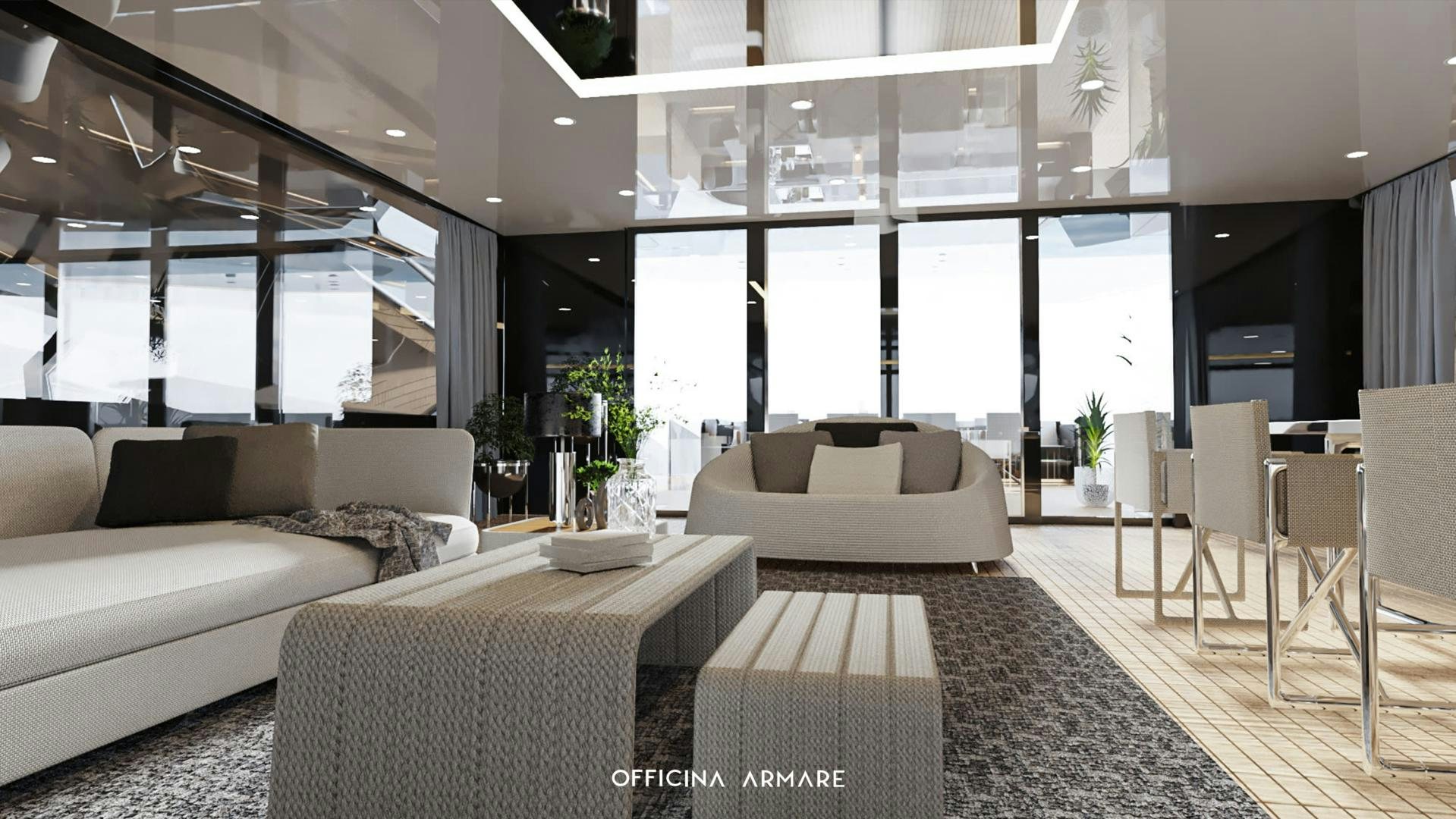 a living room with couches and a table aboard BADGAL Yacht for Sale