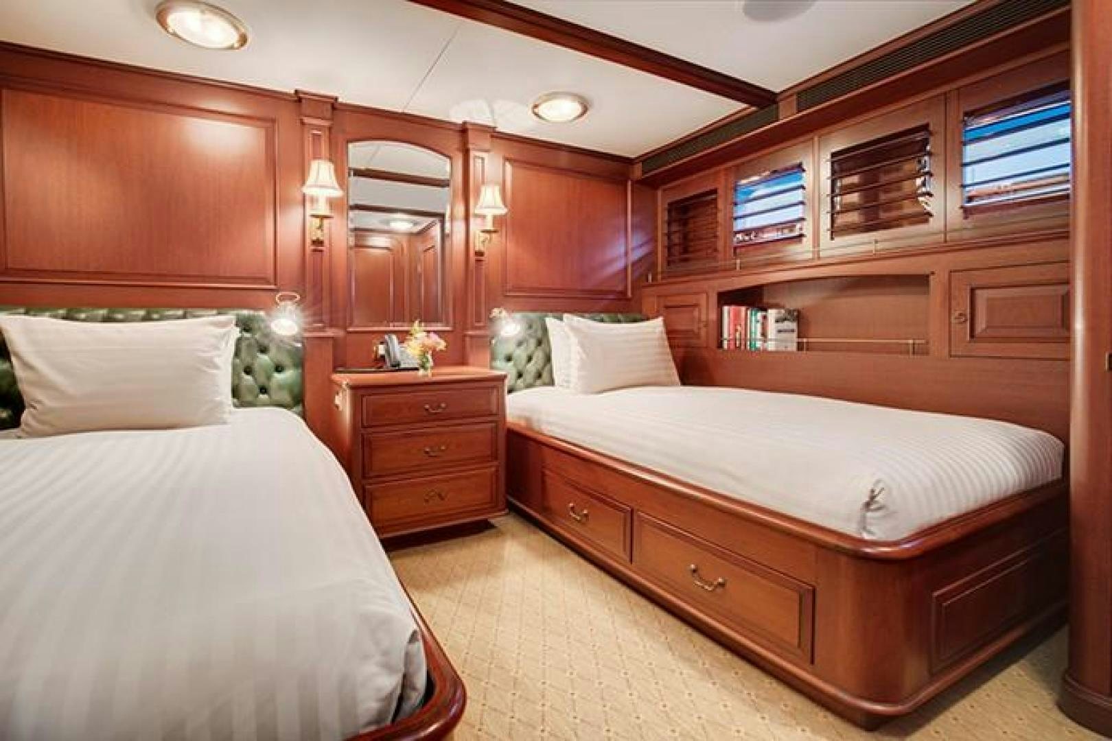 a room with two beds aboard MARLINDA Yacht for Sale