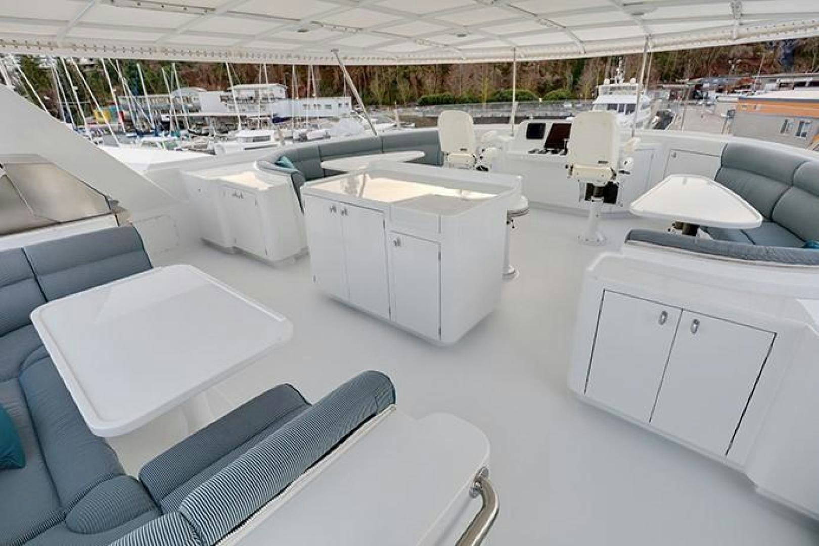 a room with many white cabinets aboard MARLINDA Yacht for Sale