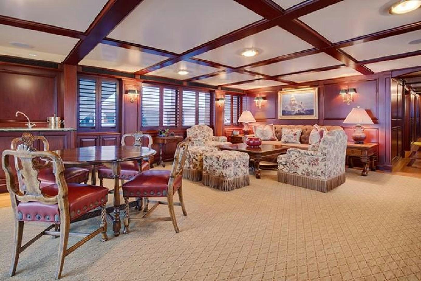 a living room with a large open floor plan aboard MARLINDA Yacht for Sale