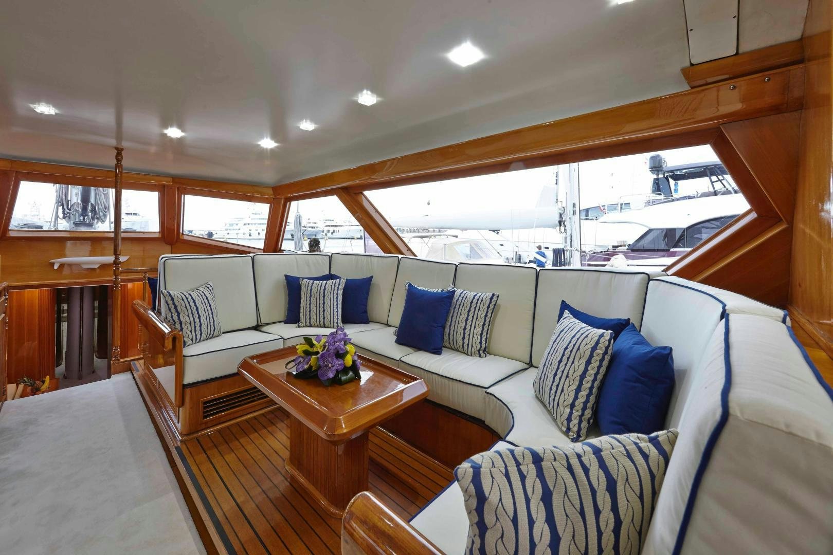 a living room with a large open window aboard LATITUDE Yacht for Sale