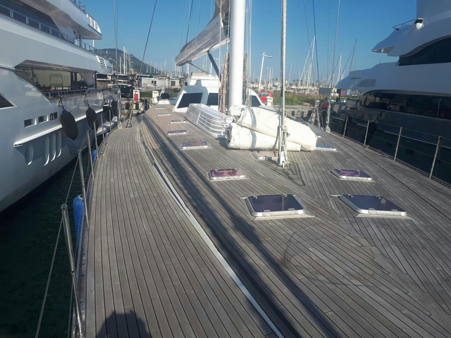 a train station with a train on the tracks aboard LATITUDE Yacht for Sale