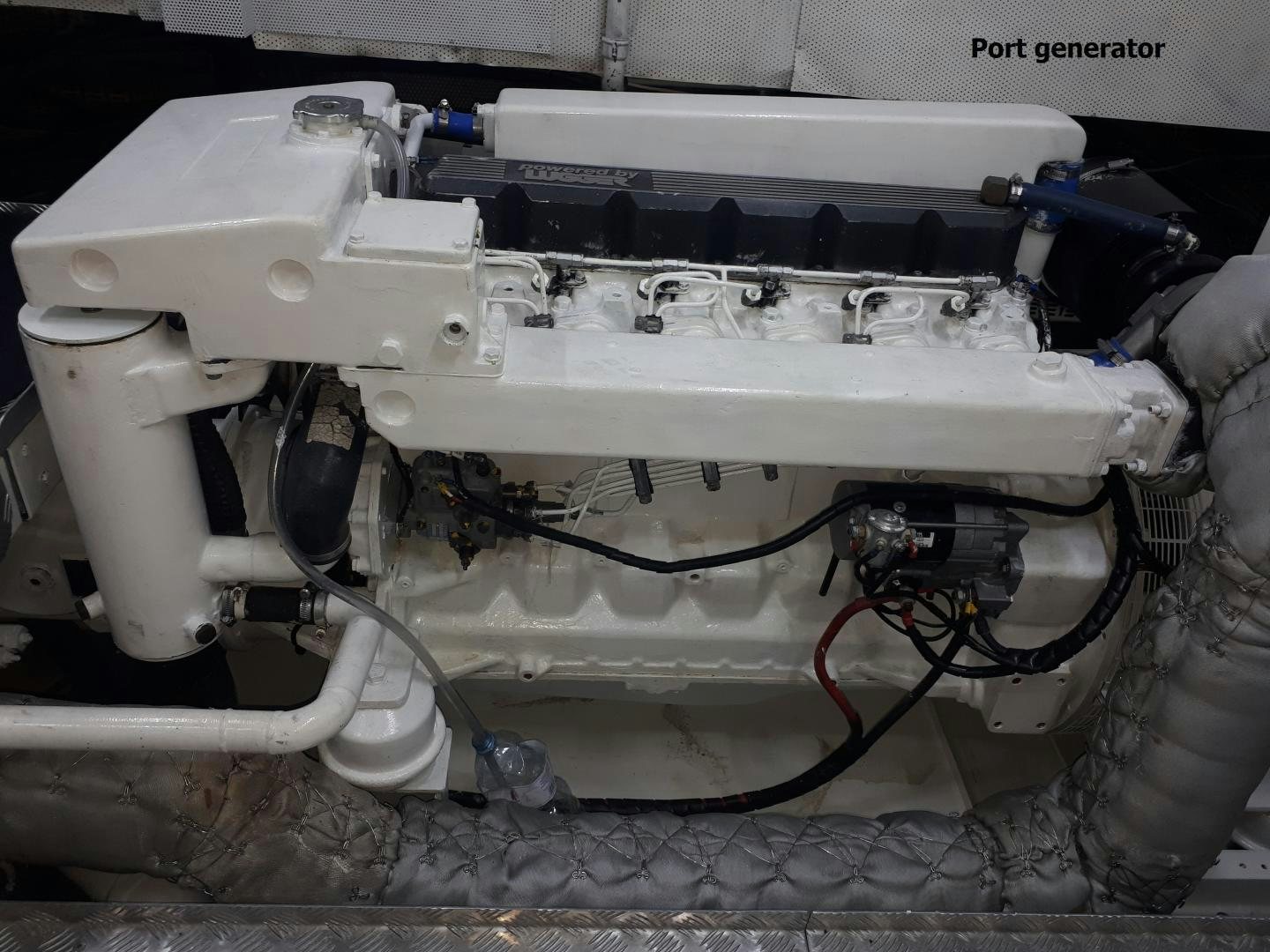 a close-up of a car engine aboard LATITUDE Yacht for Sale