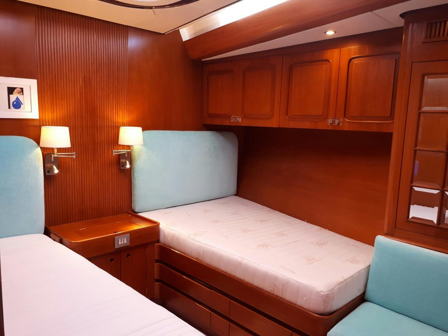 a hotel room with a bed aboard LATITUDE Yacht for Sale