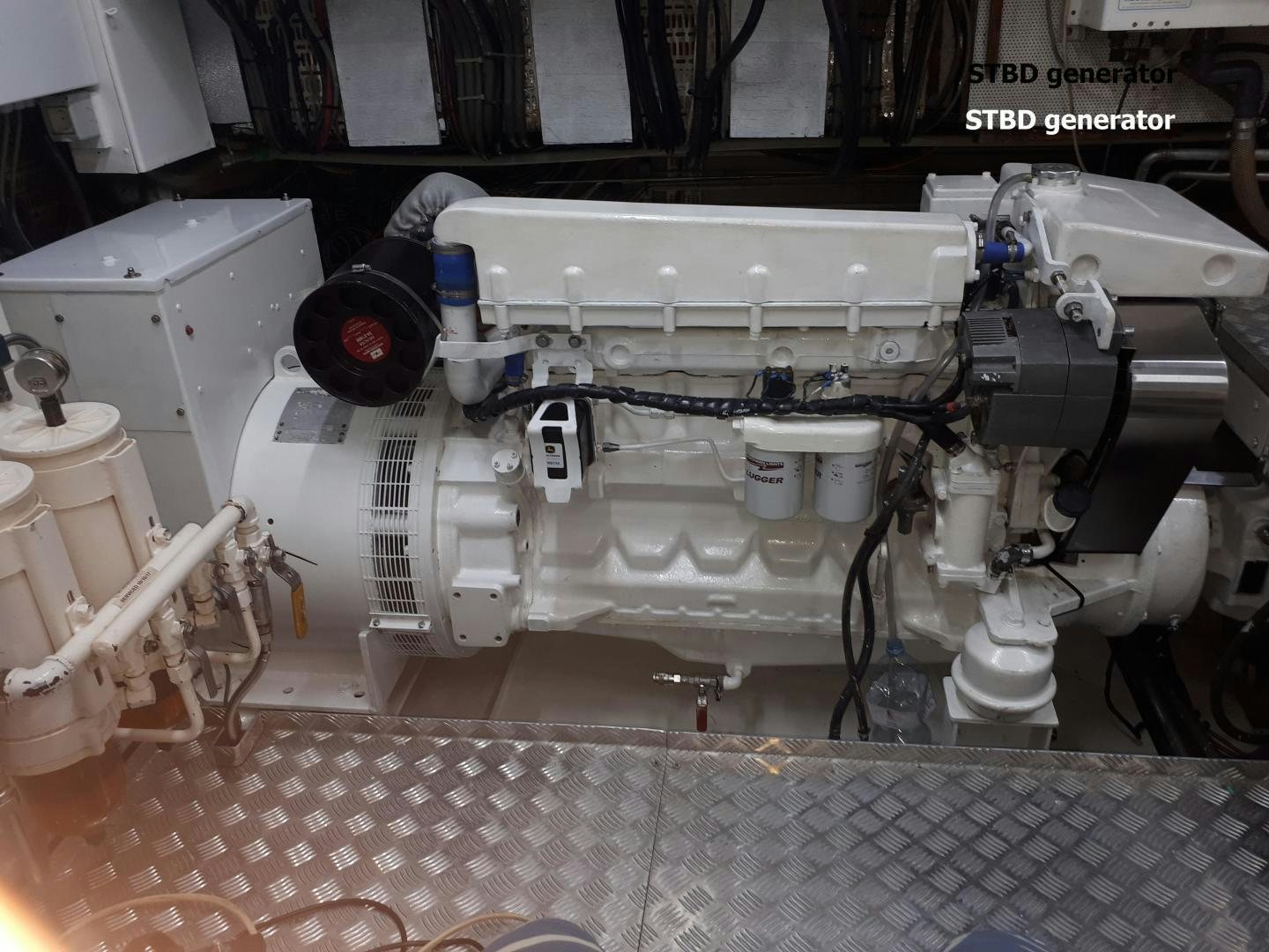 a machine with a large piece of equipment on it aboard LATITUDE Yacht for Sale