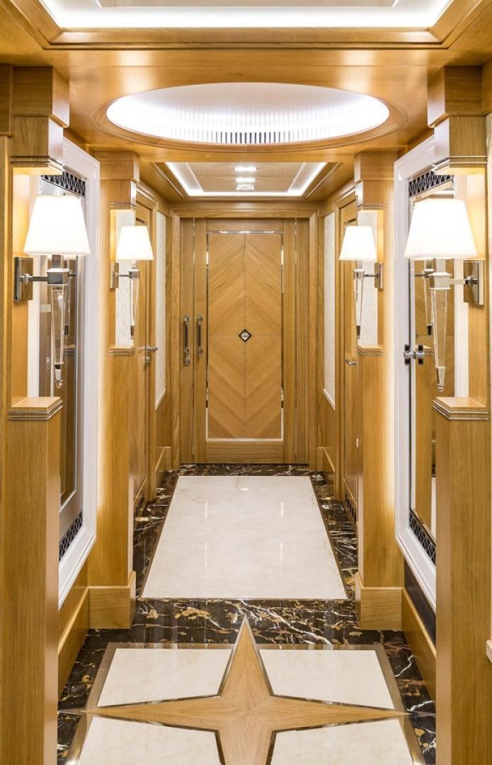 a hallway with a light aboard VIATORIS Yacht for Sale