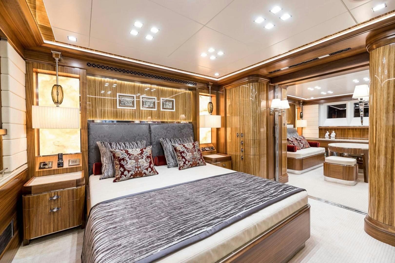 a large bedroom with a large bed aboard VIATORIS Yacht for Sale