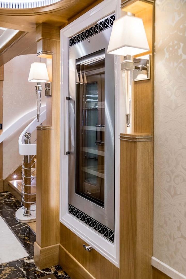 a large black and white cabinet with a light on it aboard VIATORIS Yacht for Sale