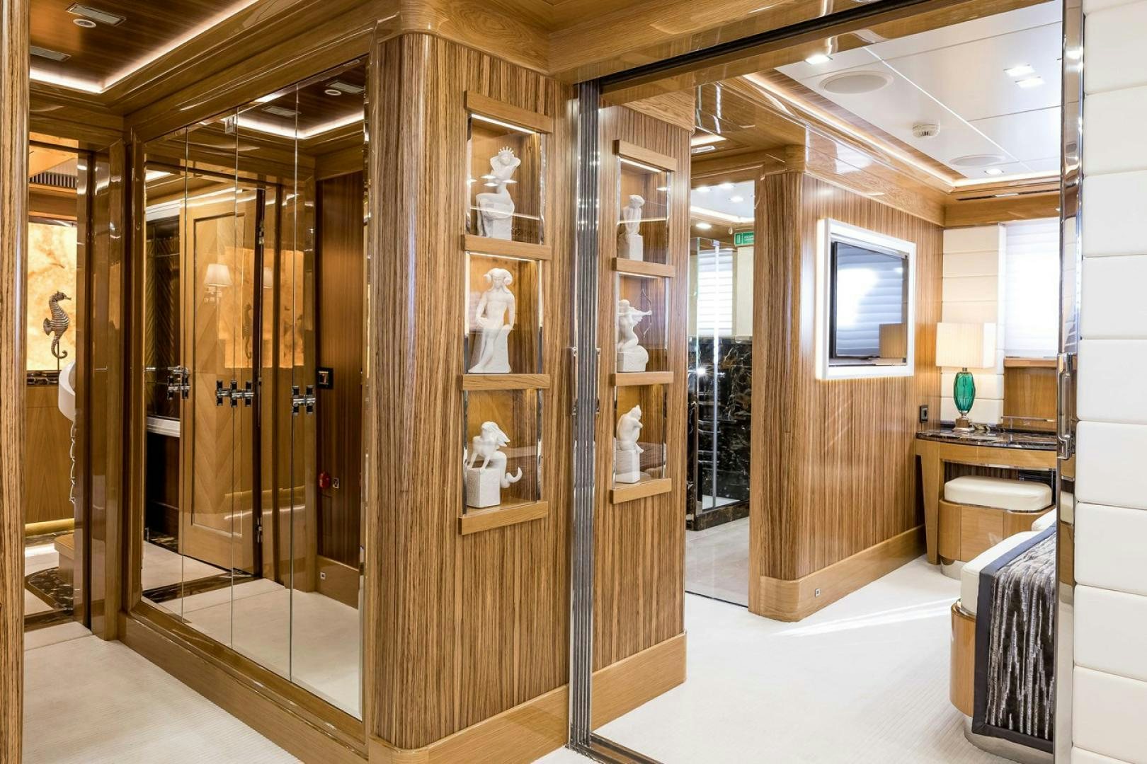 a room with a glass door aboard VIATORIS Yacht for Sale
