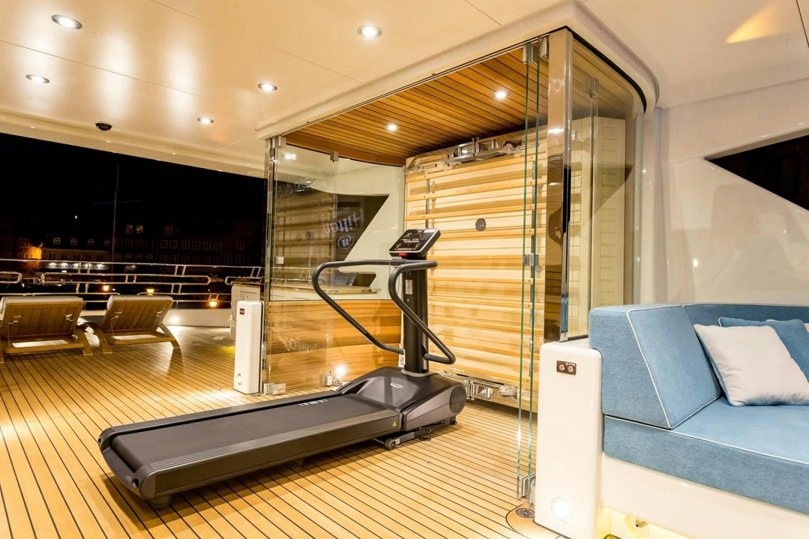 a room with a large mirror and a couch aboard VIATORIS Yacht for Sale