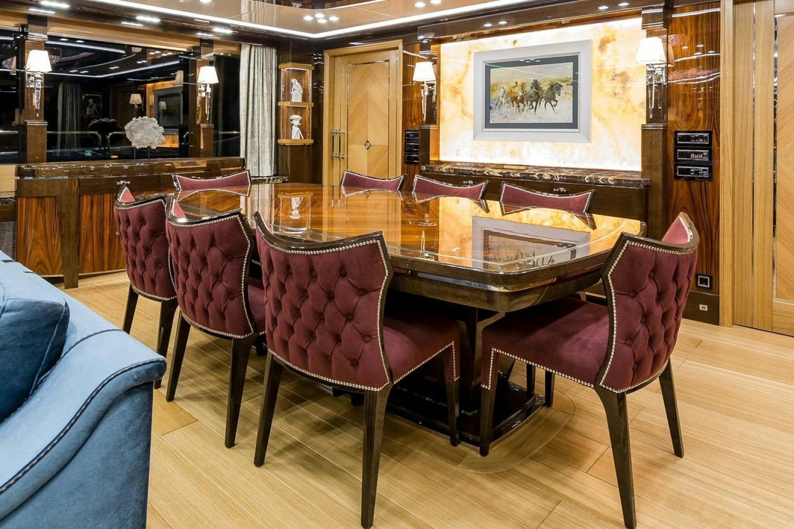 a room with a table and chairs aboard VIATORIS Yacht for Sale