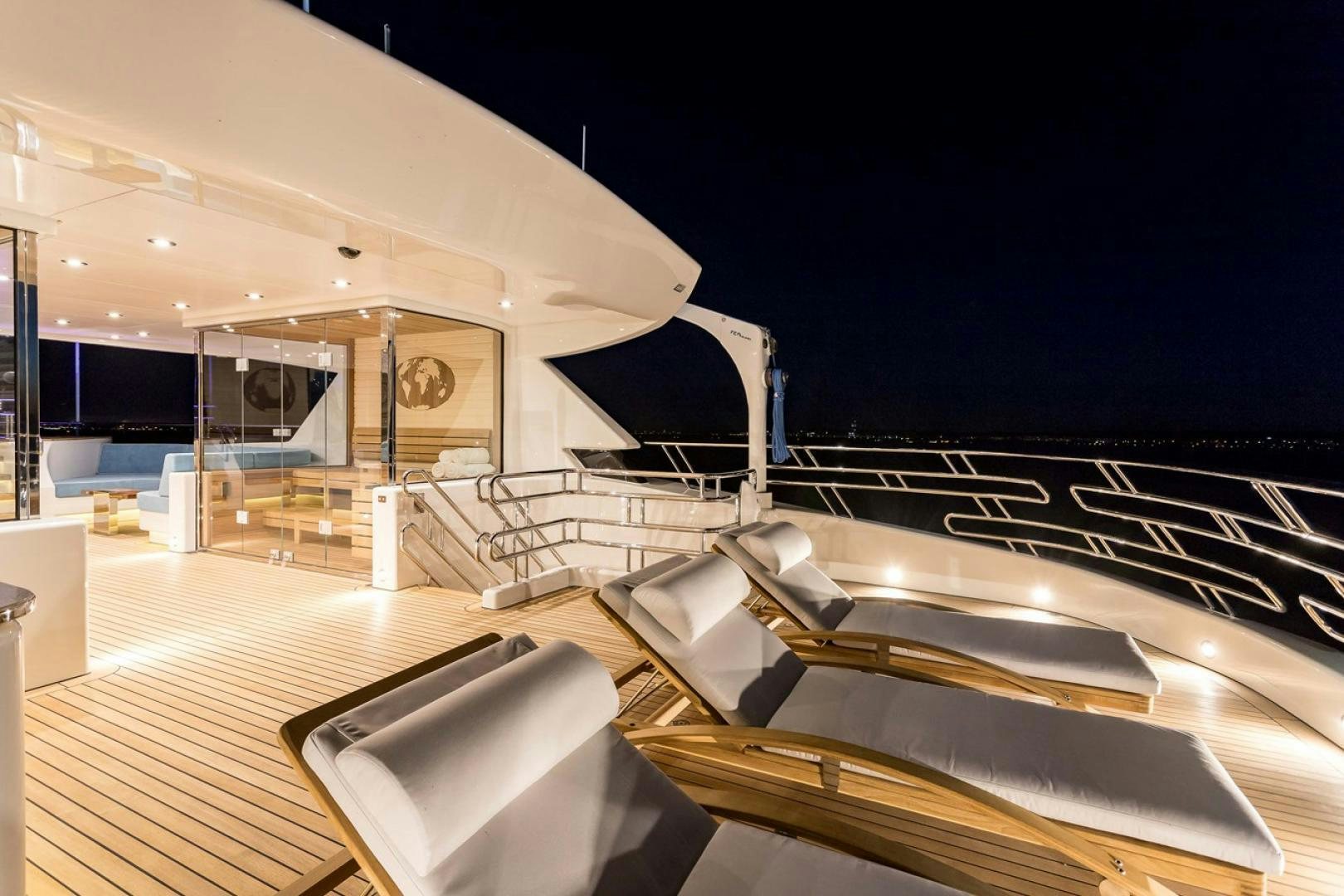 a large room with a piano aboard VIATORIS Yacht for Sale