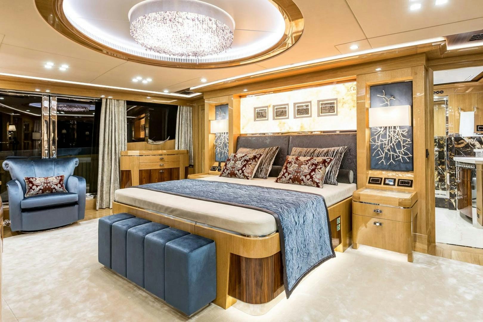 a large bedroom with a large bed aboard VIATORIS Yacht for Sale