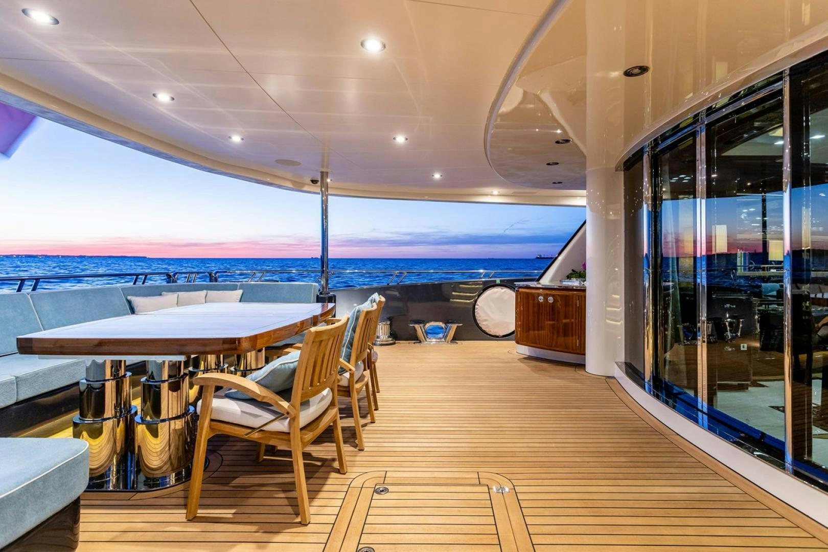 a room with a table and chairs aboard VIATORIS Yacht for Sale