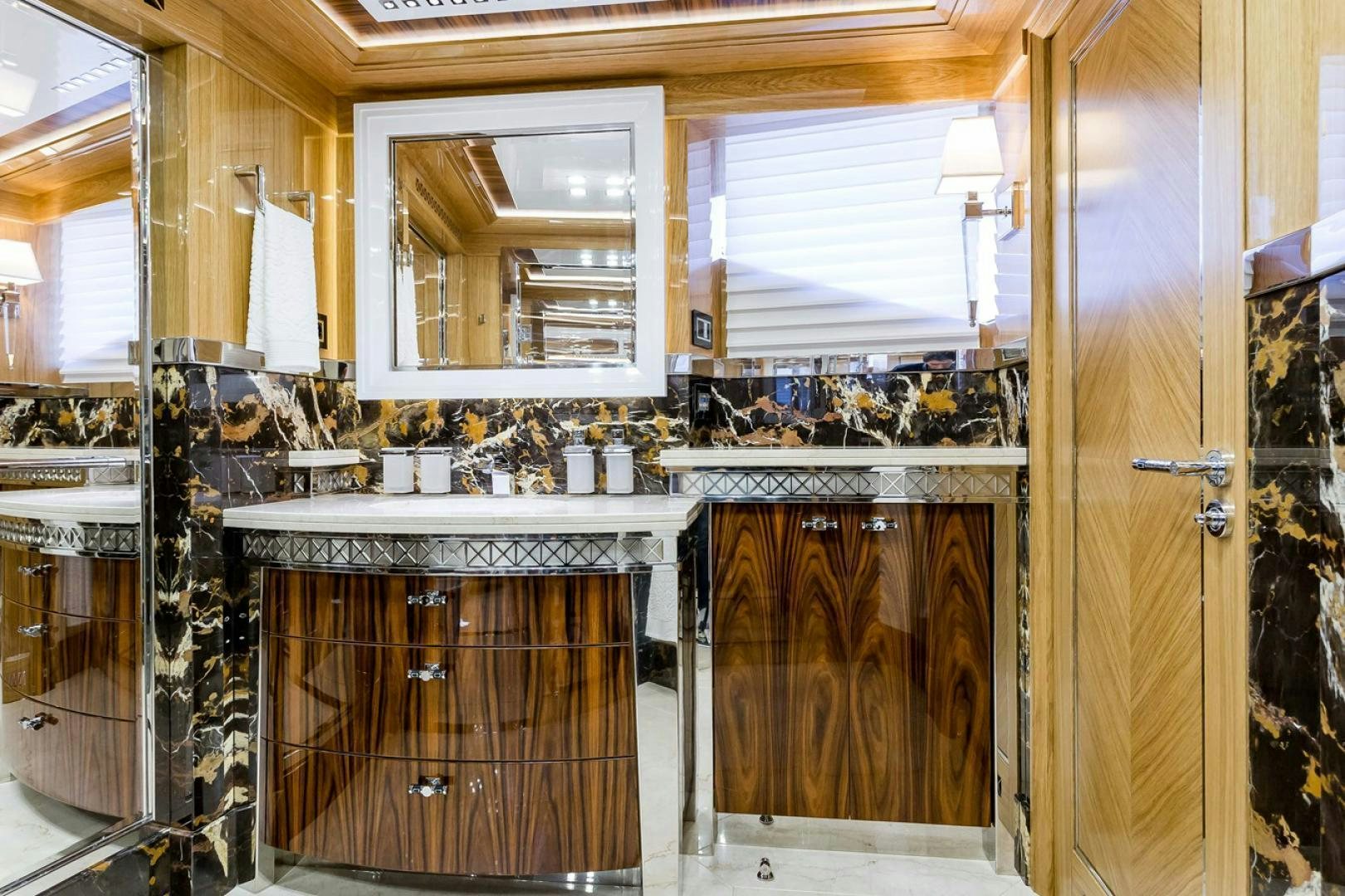 a kitchen with a sink and cabinets aboard VIATORIS Yacht for Sale