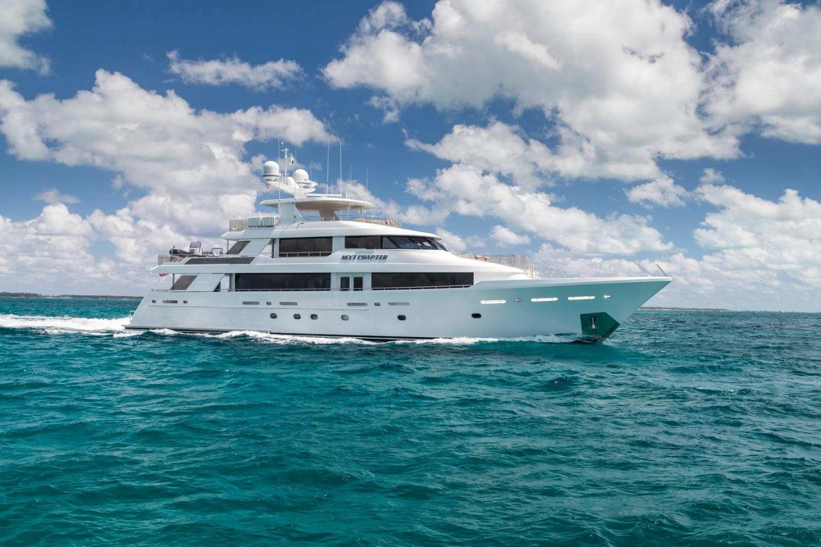 a white yacht in the water aboard NEXT CHAPTER Yacht for Sale