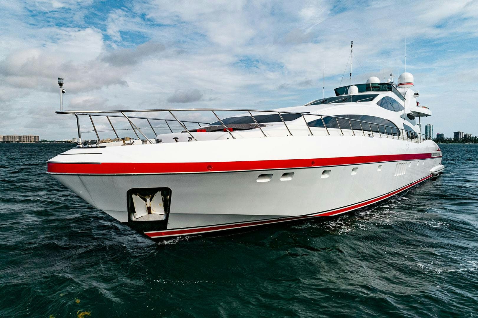 a white and red boat aboard HARMONIC WAVES Yacht for Sale