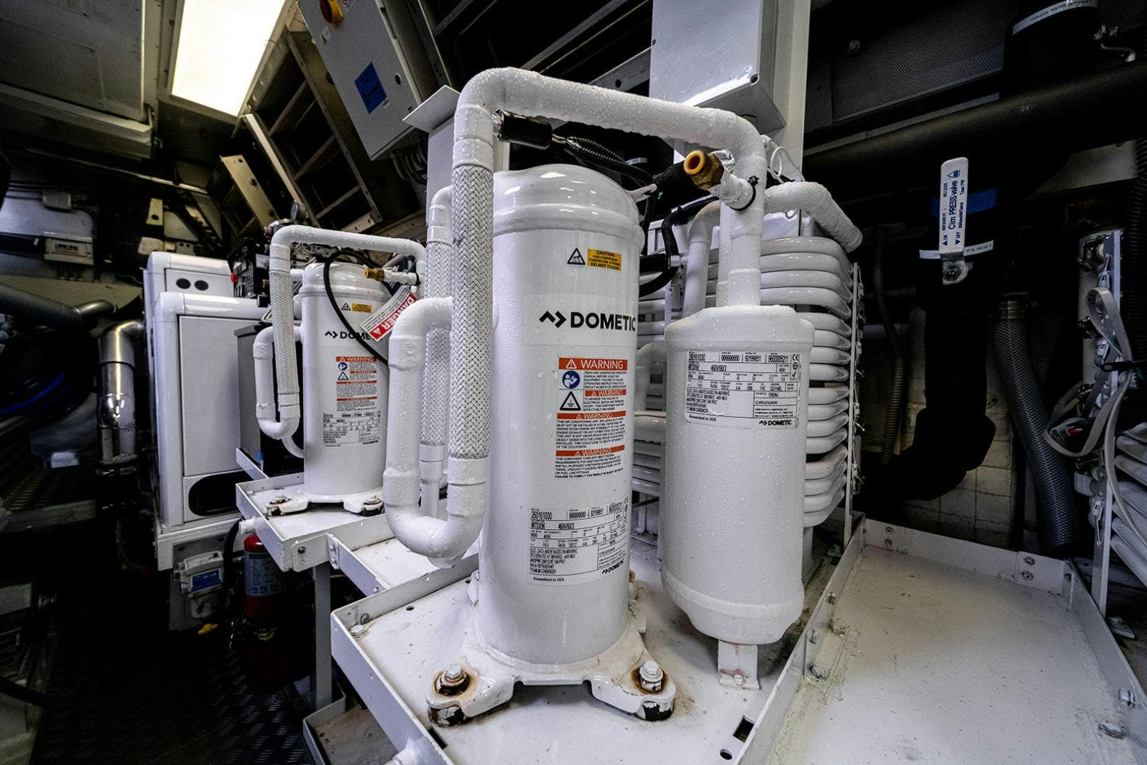 a machine in a factory aboard HARMONIC WAVES Yacht for Sale