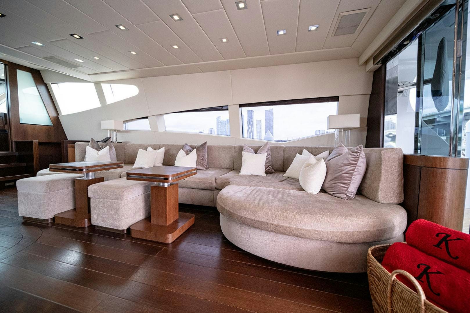 a living room with a couch and a table aboard HARMONIC WAVES Yacht for Sale