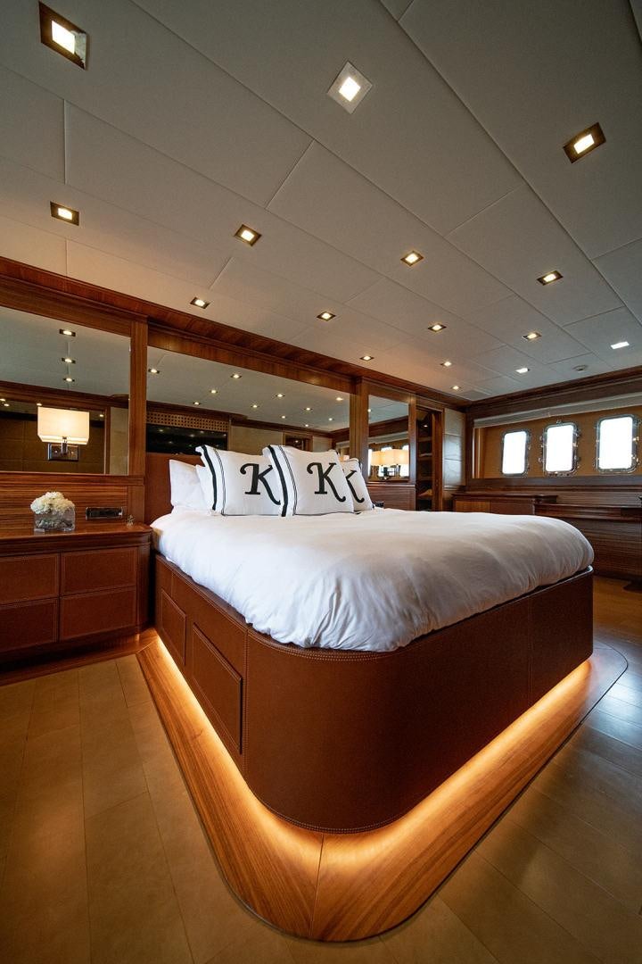 a bed in a room aboard HARMONIC WAVES Yacht for Sale