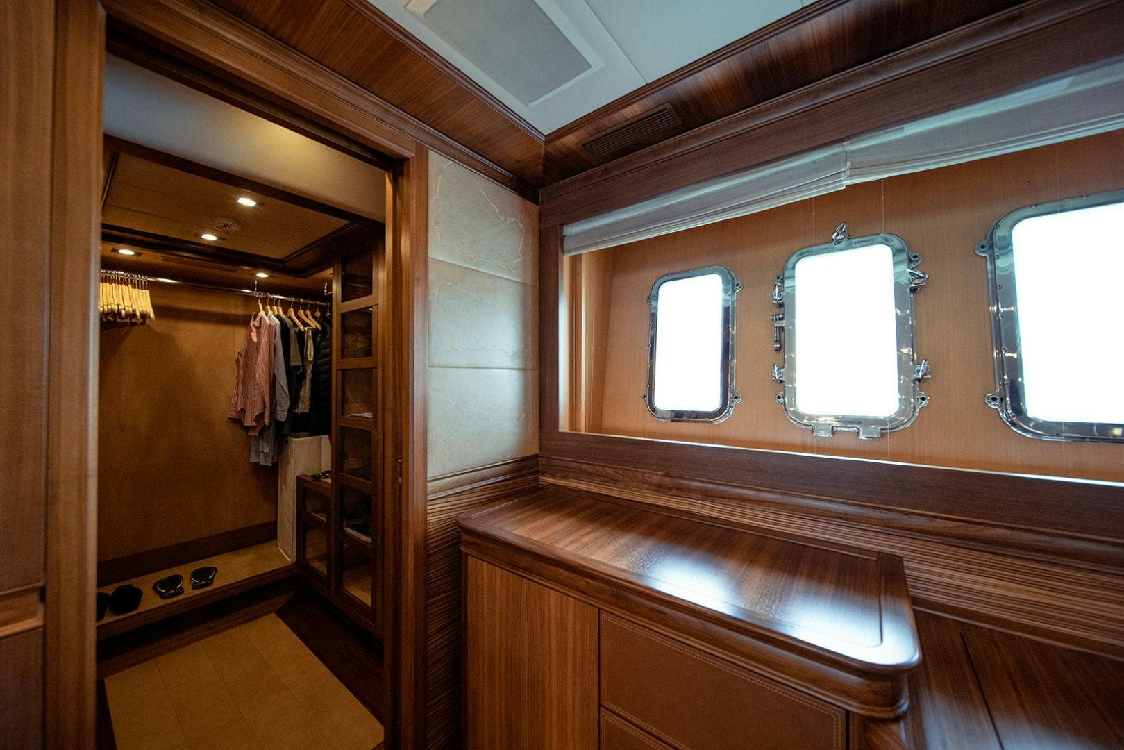 a bathroom with a large mirror aboard HARMONIC WAVES Yacht for Sale