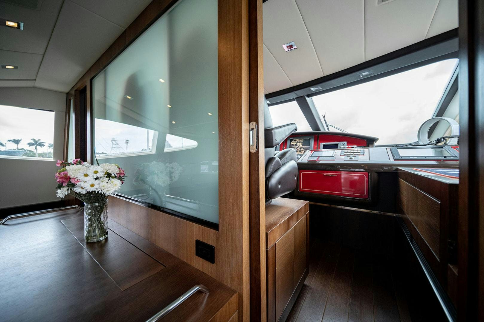 a kitchen with a large window aboard HARMONIC WAVES Yacht for Sale