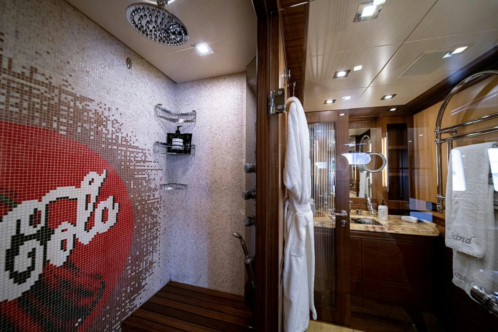 a bathroom with a shower curtain aboard HARMONIC WAVES Yacht for Sale