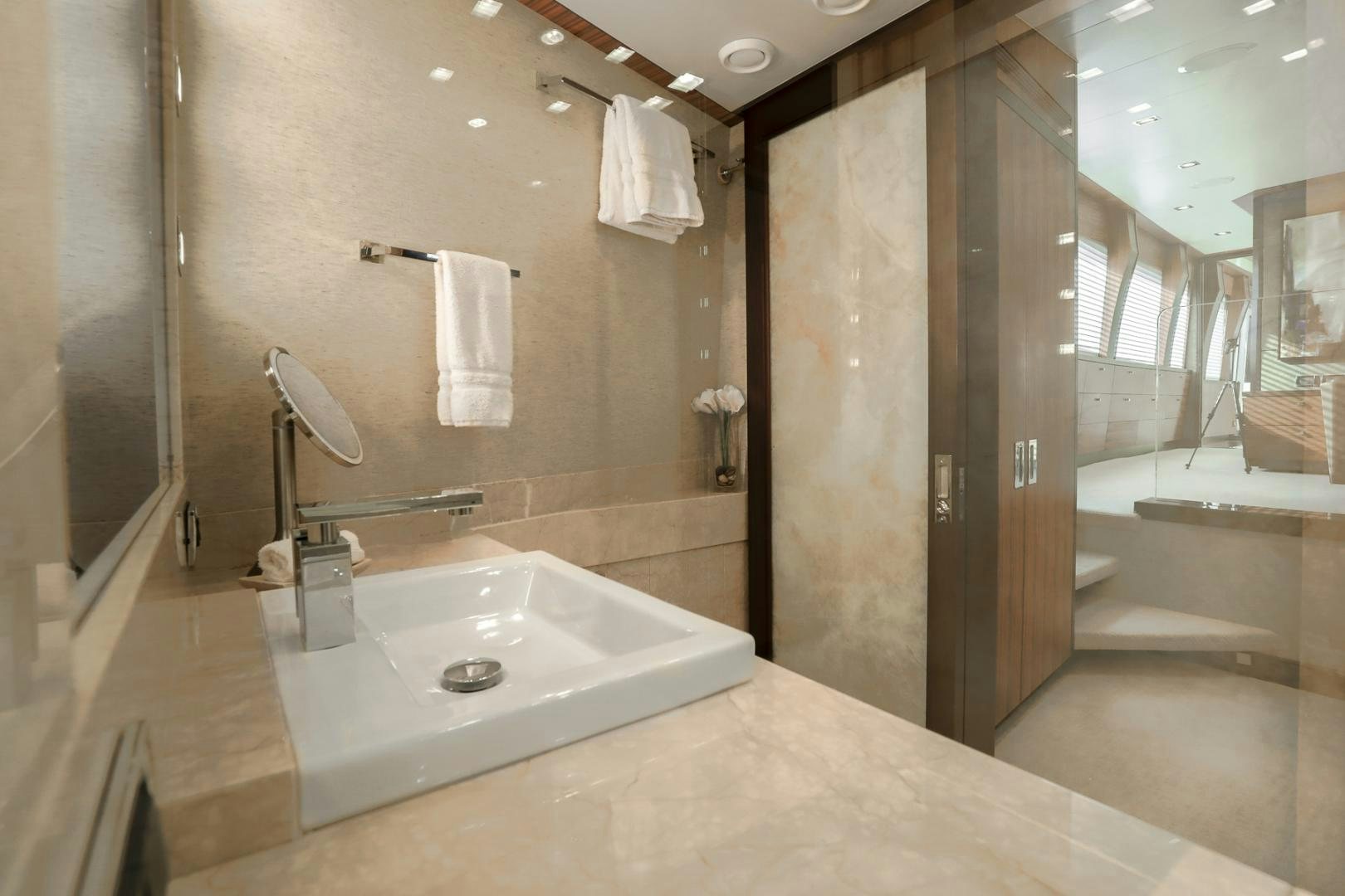 a bathroom with a large bathtub aboard FUGITIVE *NAME RESERVED* Yacht for Sale