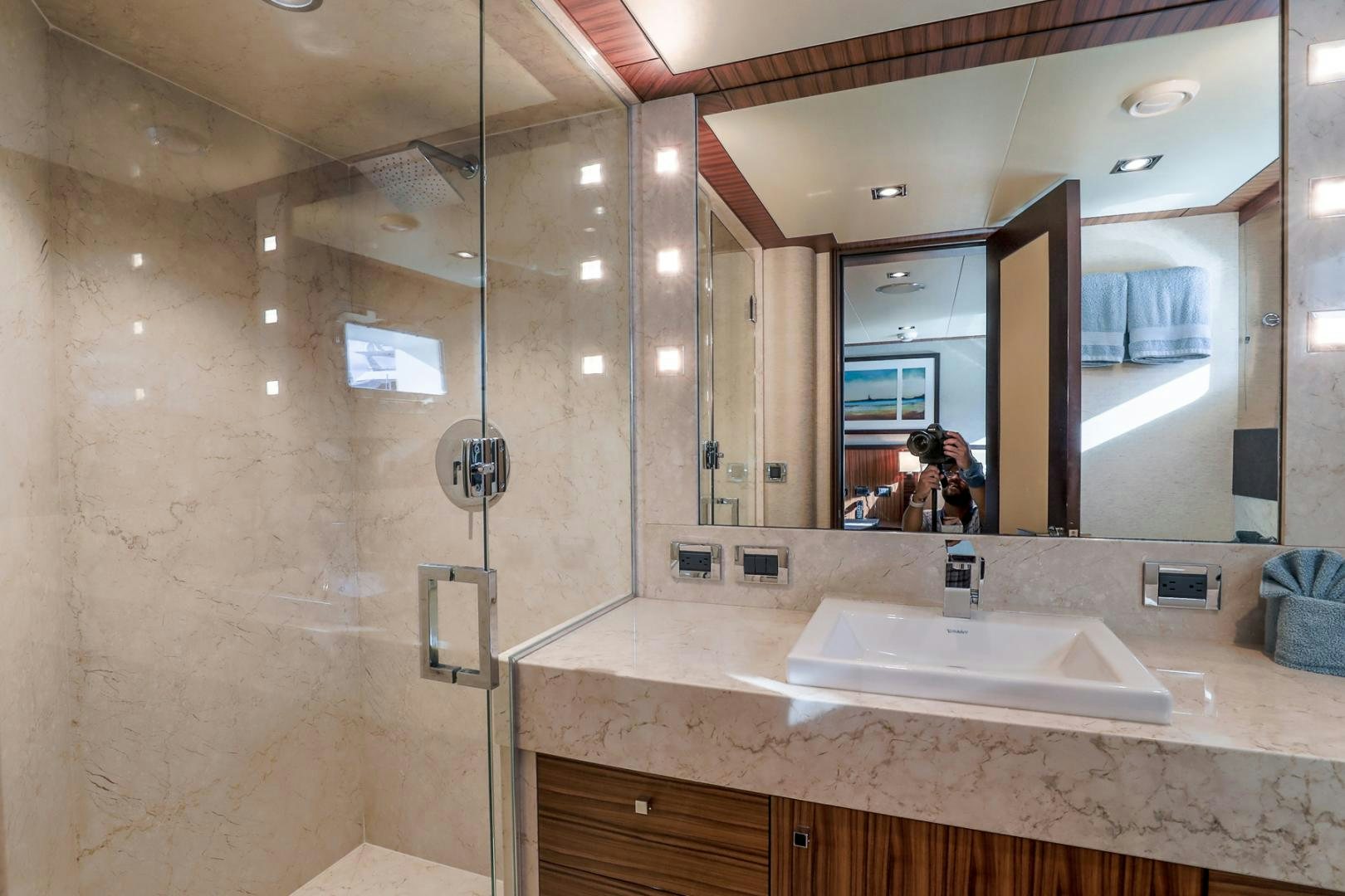 a bathroom with a large mirror aboard FUGITIVE *NAME RESERVED* Yacht for Sale