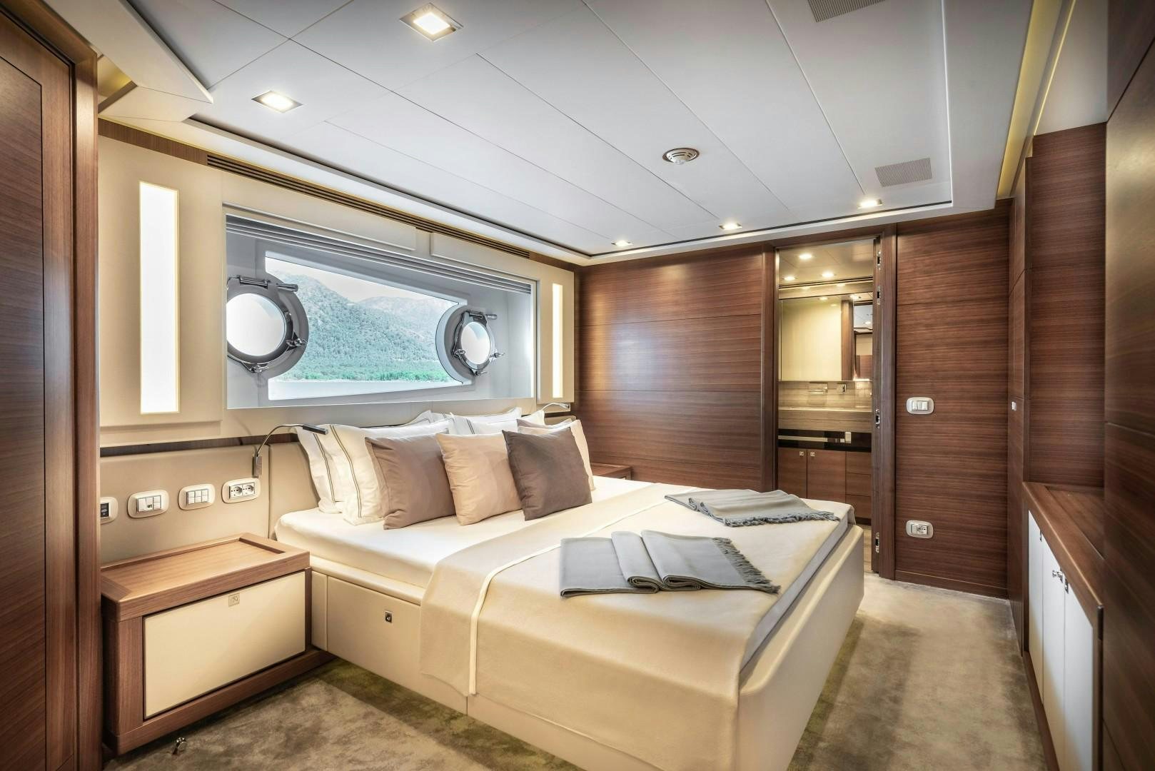 a bed in a room aboard ARGENTO Yacht for Sale
