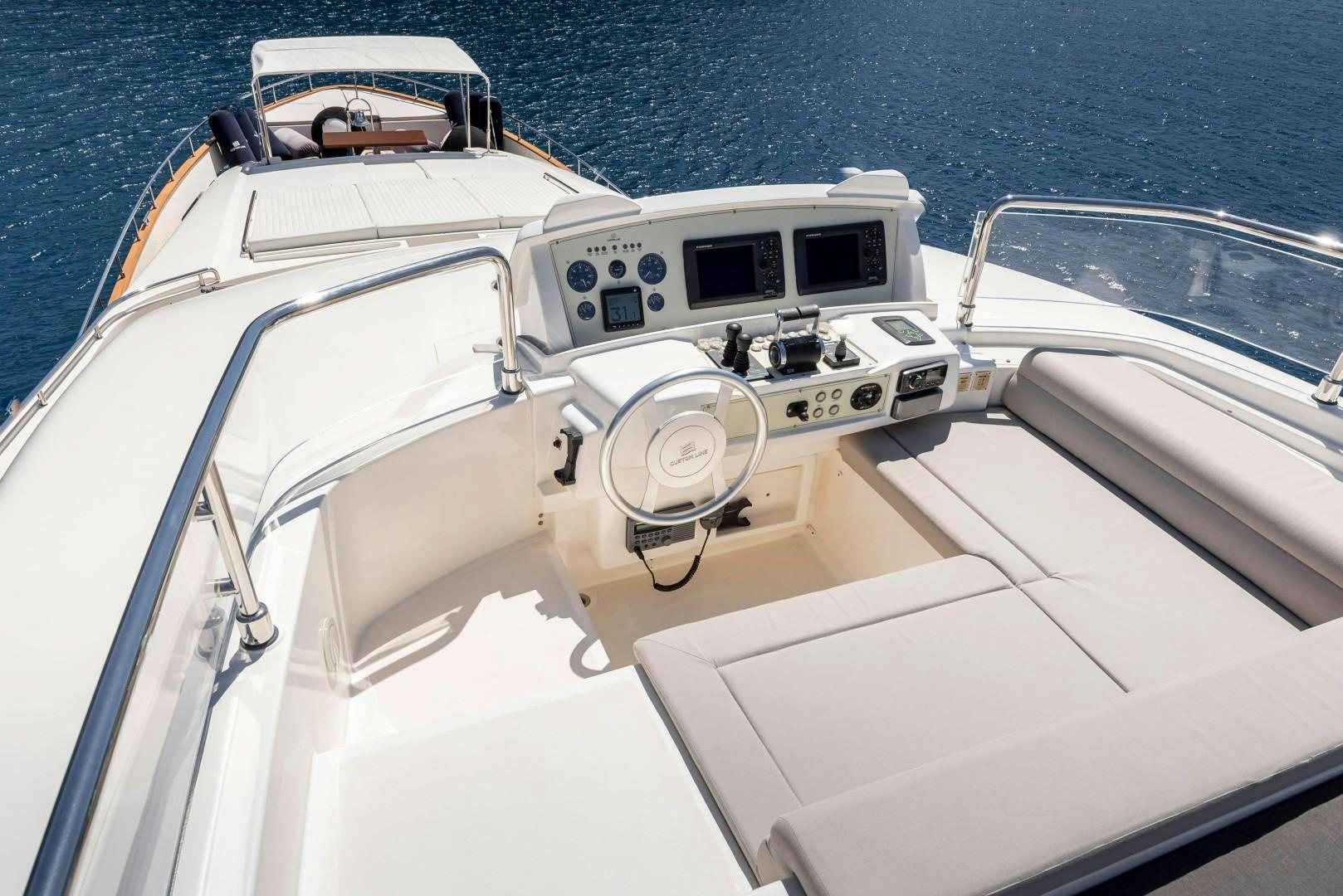 a boat with a steering wheel aboard ARGENTO Yacht for Sale