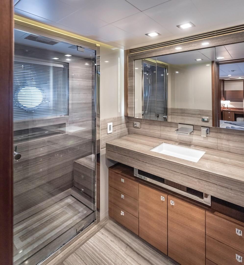 a bathroom with a large mirror aboard ARGENTO Yacht for Sale