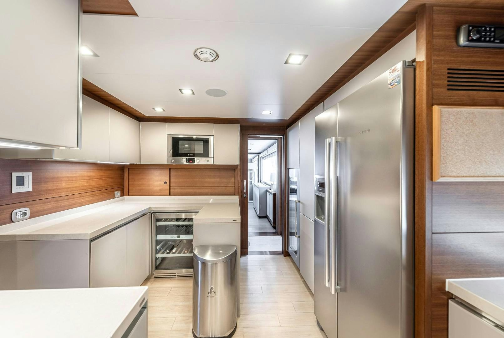 a kitchen with stainless steel appliances aboard ARGENTO Yacht for Sale
