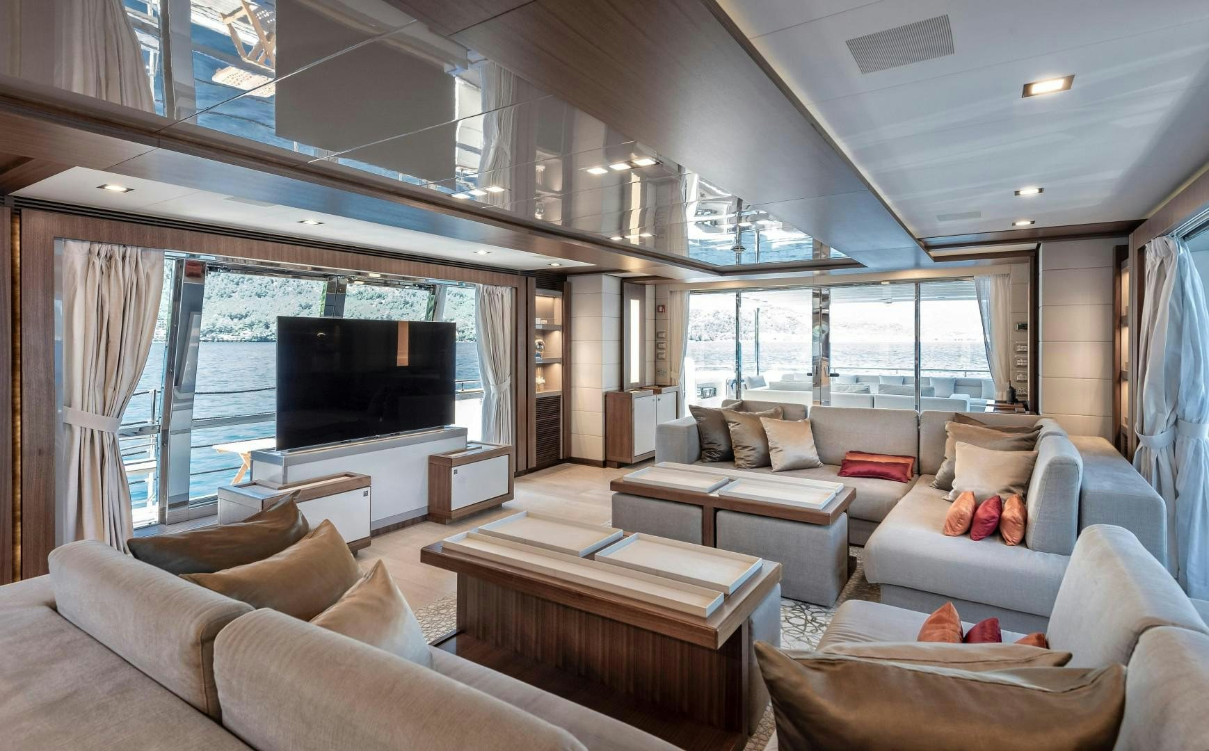 a living room with a large tv aboard ARGENTO Yacht for Sale