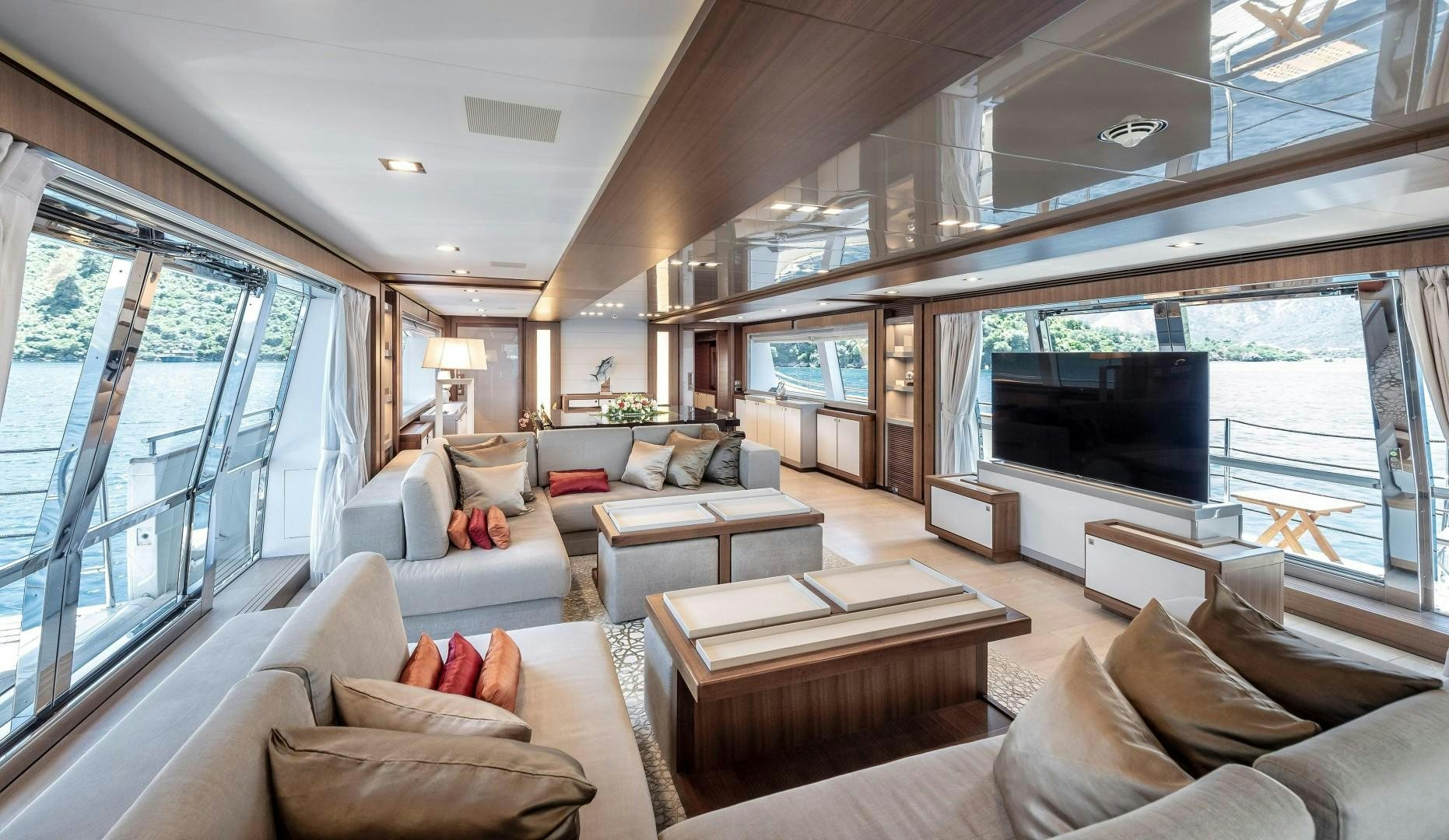 a living room with a large window aboard ARGENTO Yacht for Sale