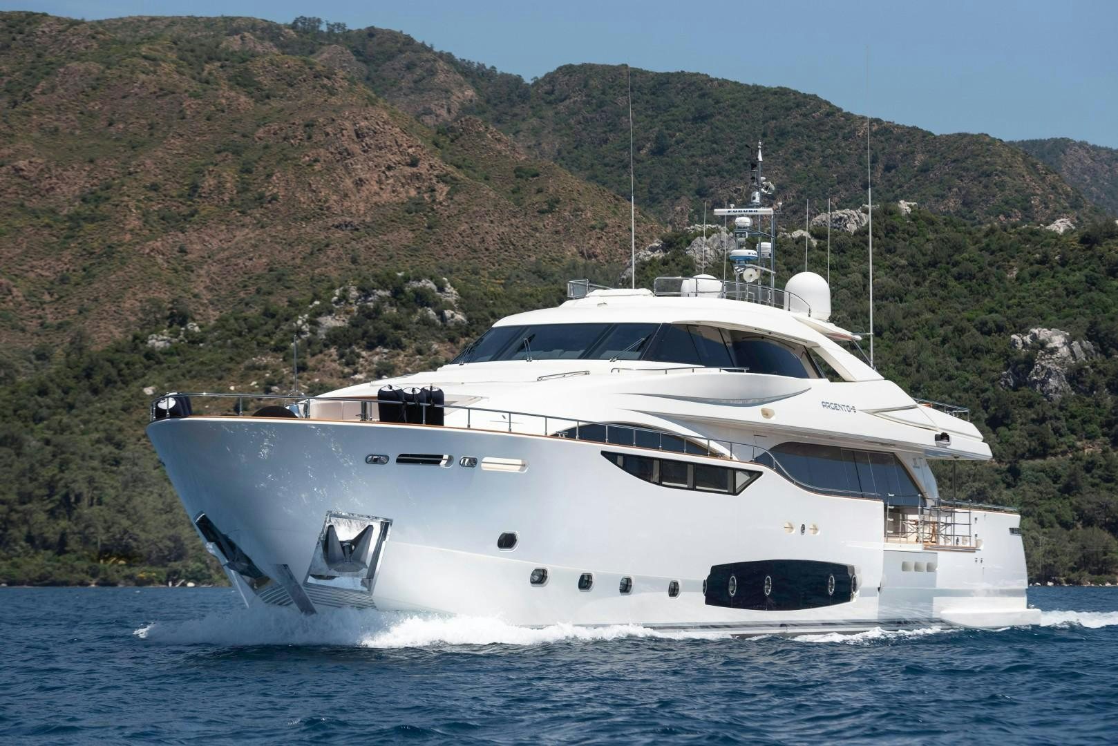 a white yacht on the water aboard ARGENTO Yacht for Sale