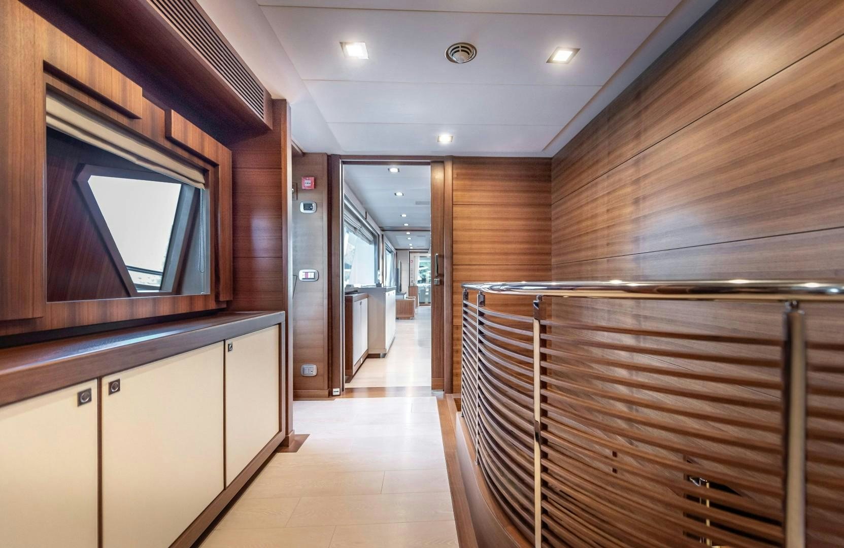 a hallway with wooden walls aboard ARGENTO Yacht for Sale