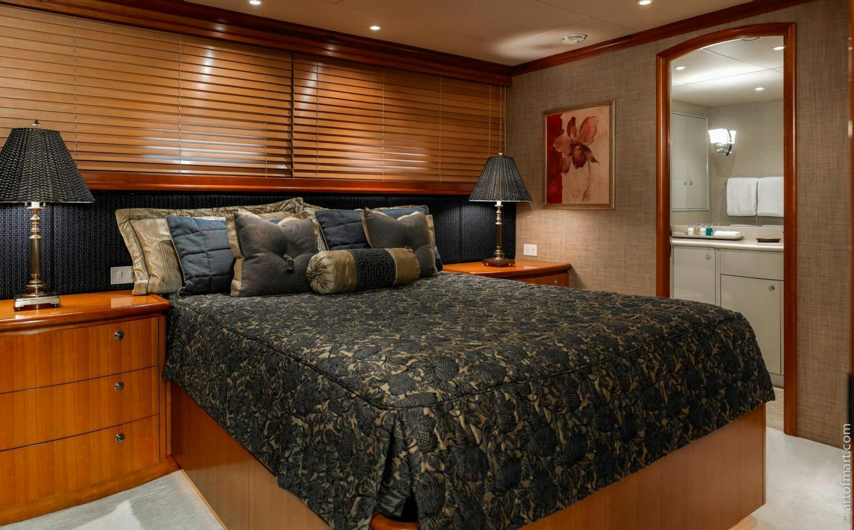 a bed with a black comforter aboard MURPHY'S LAW Yacht for Sale