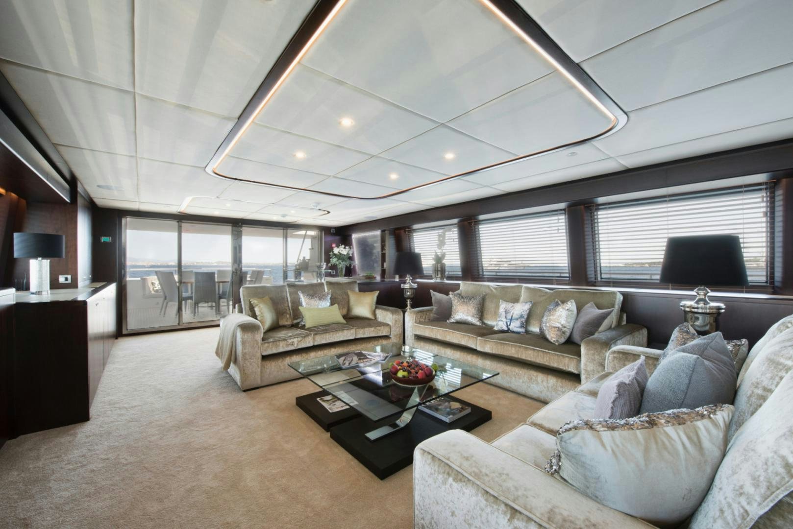 a living room with a large window aboard CRYSTAL Yacht for Sale