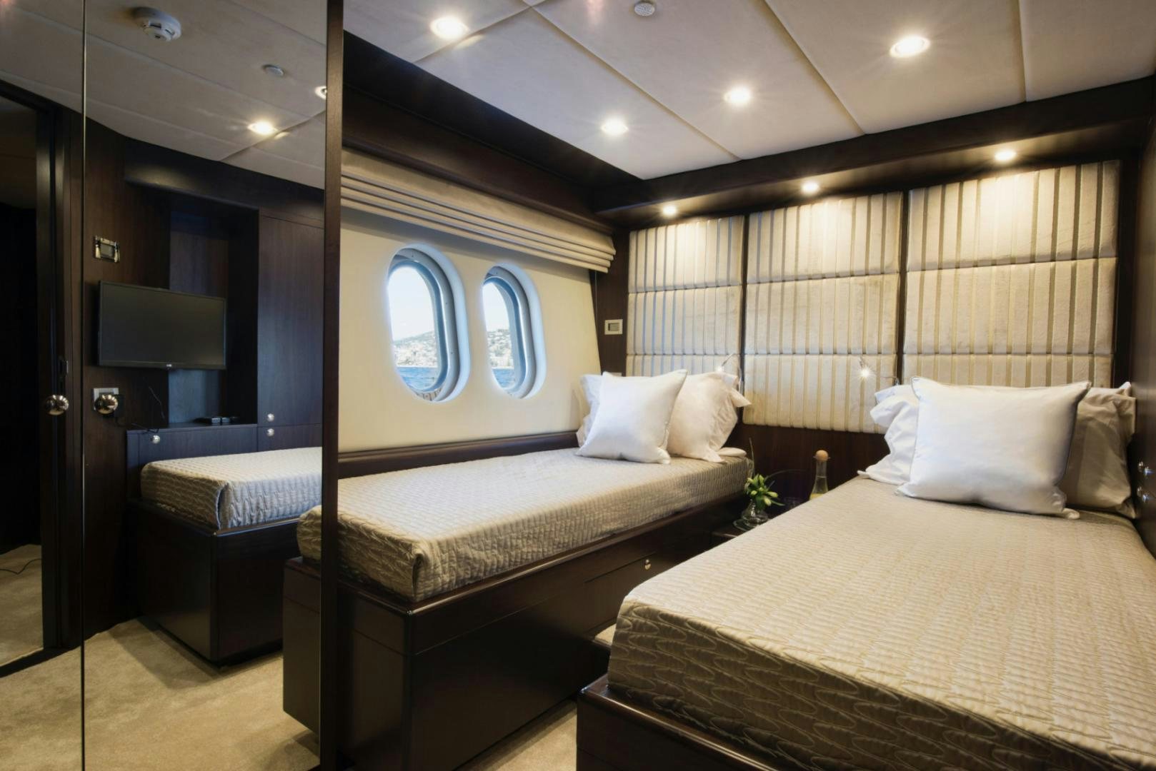 a room with two beds aboard CRYSTAL Yacht for Sale