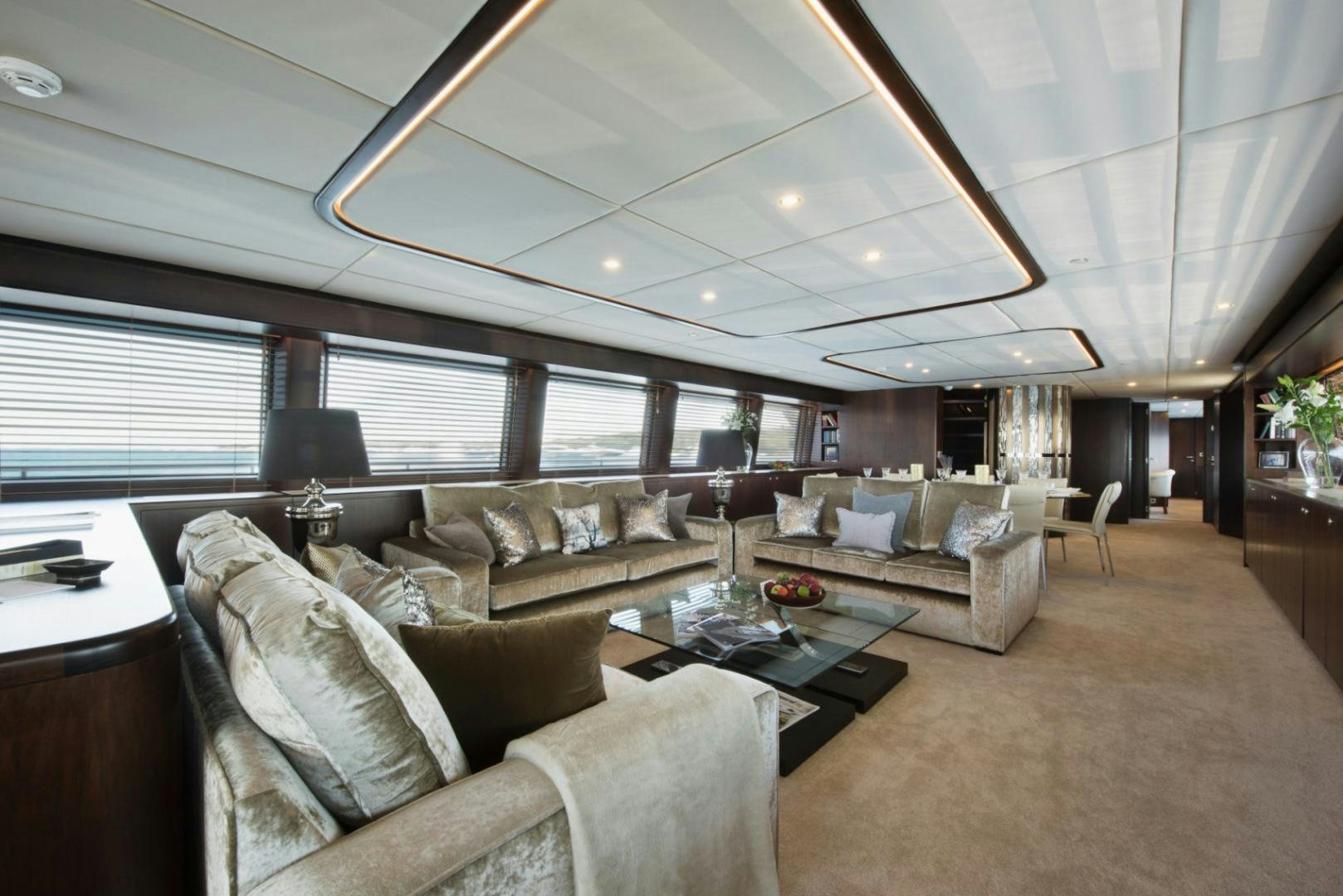 a living room with a large window aboard CRYSTAL Yacht for Sale