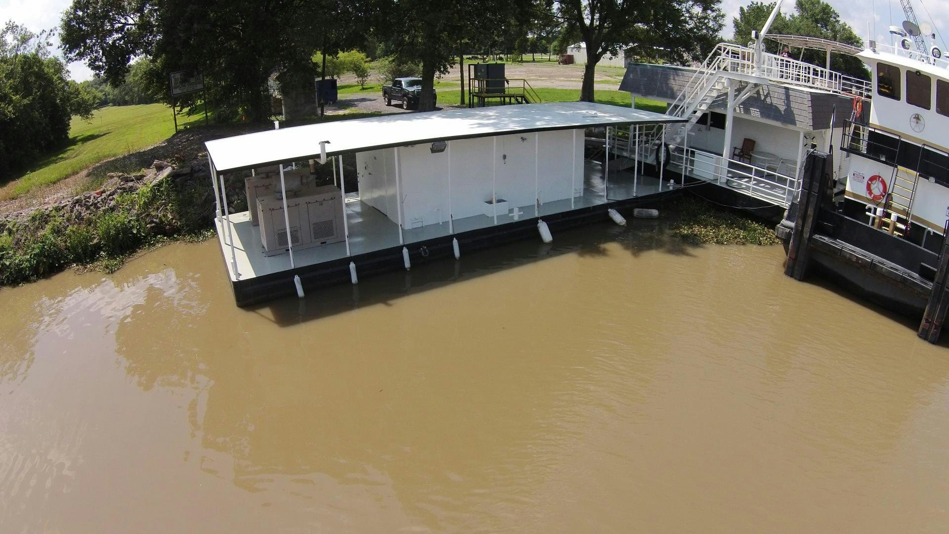 a boat in a river aboard LAKEHOUSE Yacht for Sale