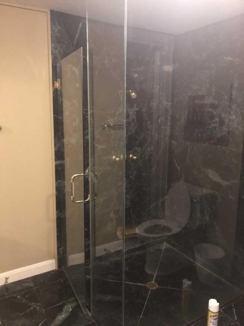 a shower with a glass door aboard LAKEHOUSE Yacht for Sale