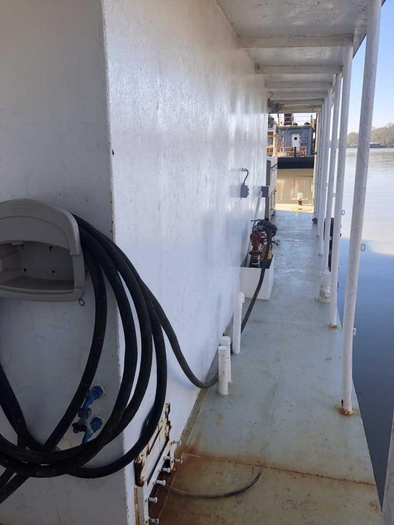 a room with a couple of large pipes and a large pipe aboard LAKEHOUSE Yacht for Sale