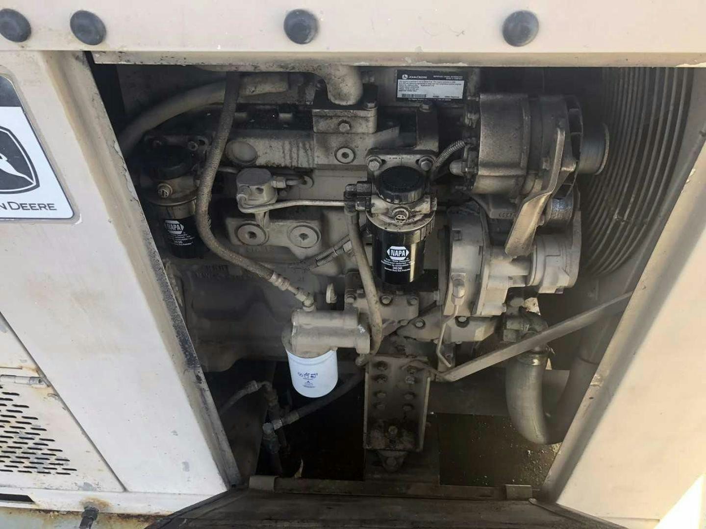 a close-up of a car engine aboard LAKEHOUSE Yacht for Sale